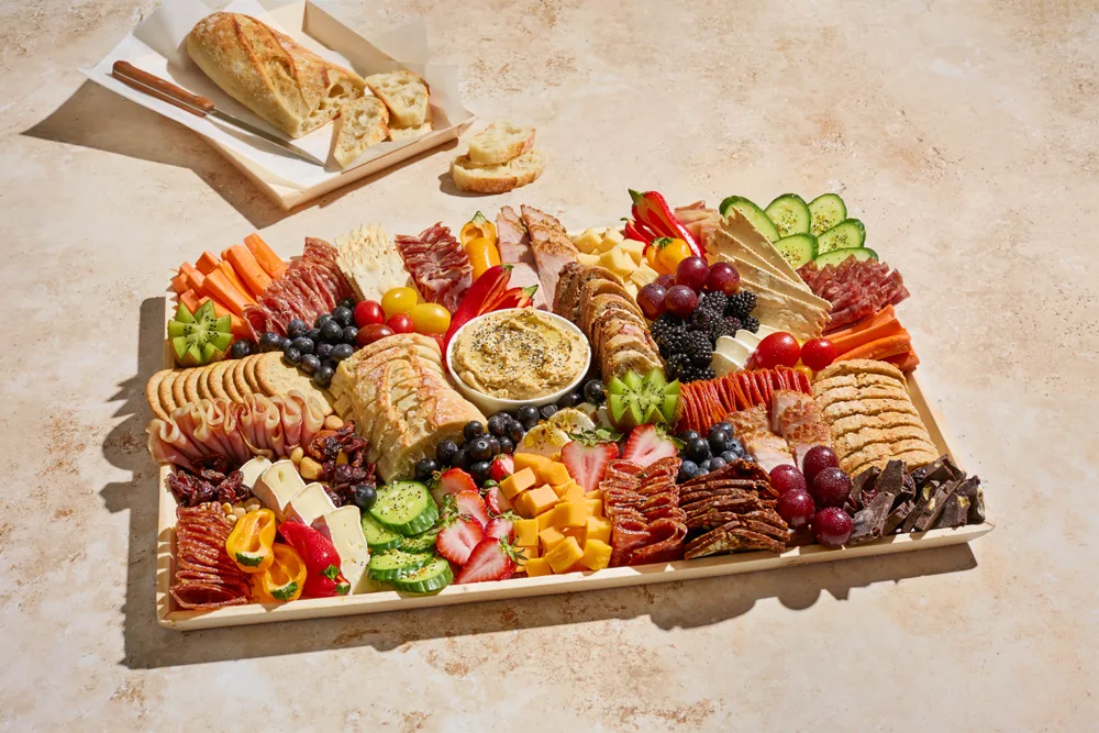 The Classic board with cured meats, cheeses, fruit and crackers